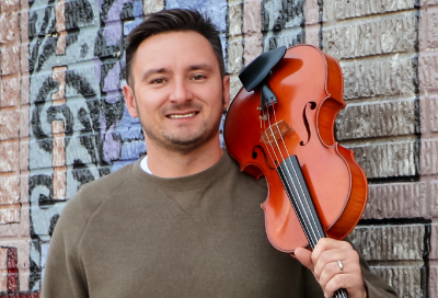 UAHS Orchestra Director Chris Lape honored as top "40 Under 40" music educator
