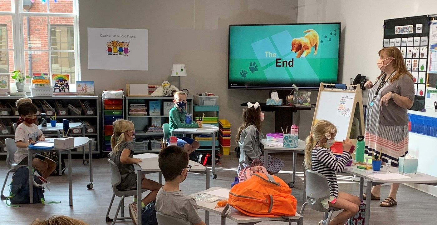 Students learning in a new classroom