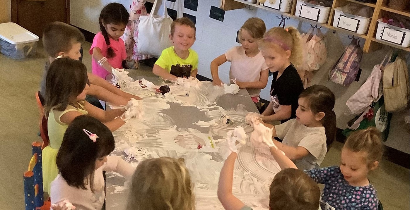 A group of students playing with shaving cream